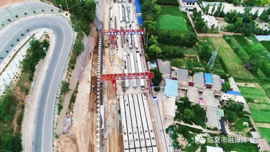 临夏市环城北路军民街跨线桥工程持续推进军民街与崔家坡路交叉口预计