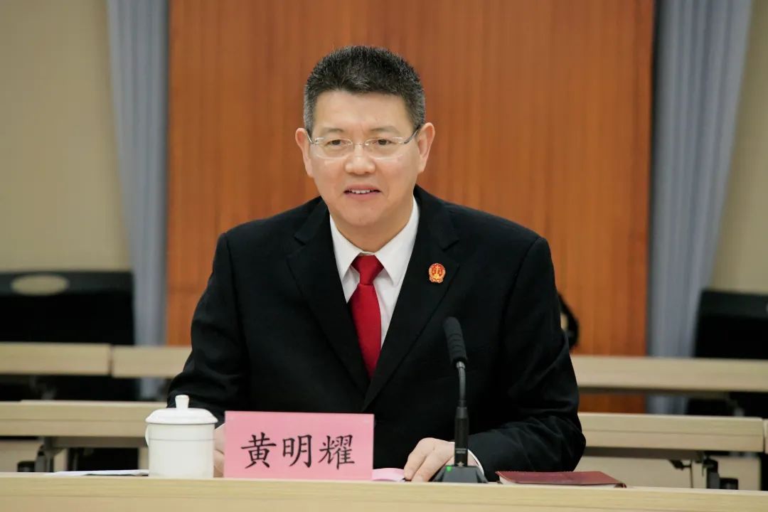 法院辖区两级法院工作黄明耀副院长对各区(县)人大常委会主任(副主任)