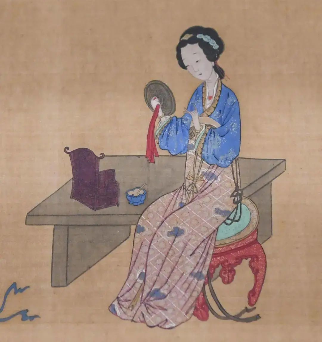 对镜贴花黄木兰的镜子依然照着世界的模样