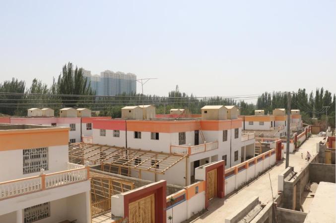 新疆维吾尔自治区住房和城乡建设厅村镇建设处让各族农牧民住有安居
