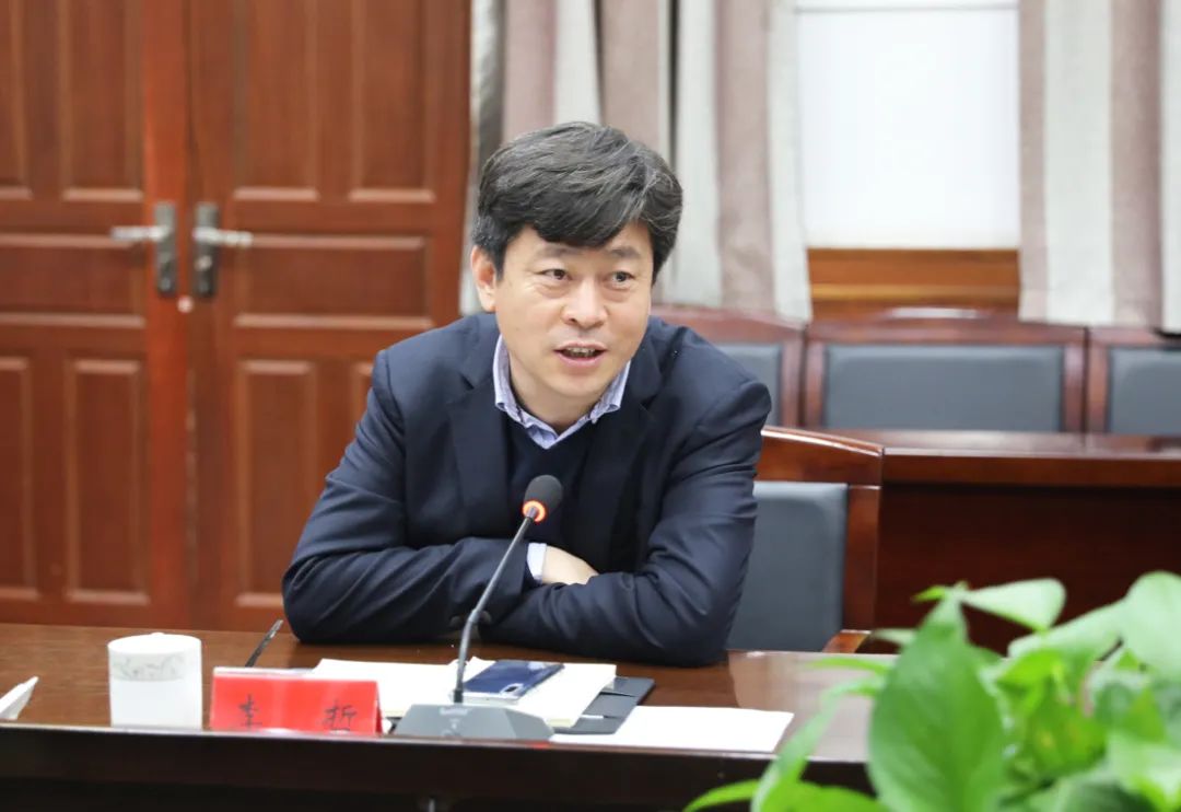 李哲与科大讯飞山西分公司副总经理陈德平座谈