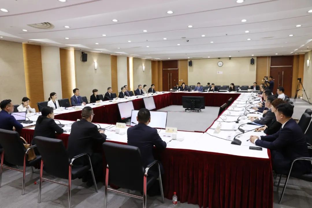 汪胜洋,秘书长沈永铭,民建中央二级调研员吴晓明,民建市委办公室副