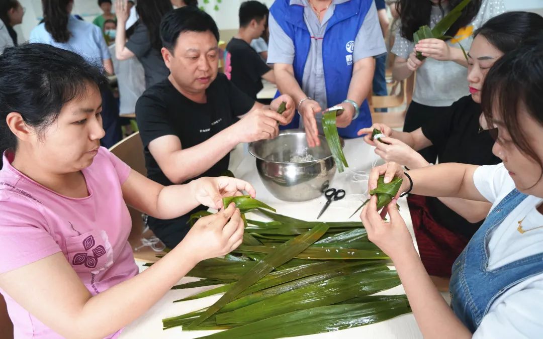 浓情端午粽叶飘香沙市区人民法院举办端午节包粽子比赛