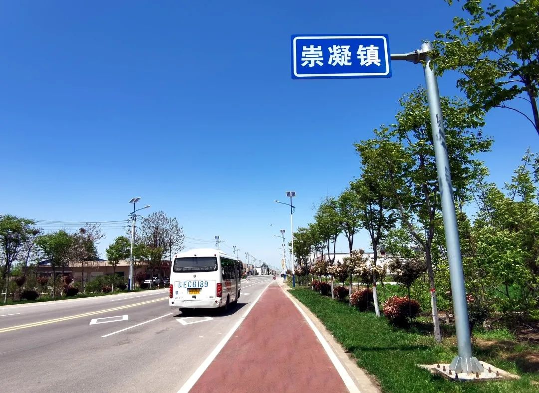 循红色足迹看交通新貌崇凝镇路通地头车到村