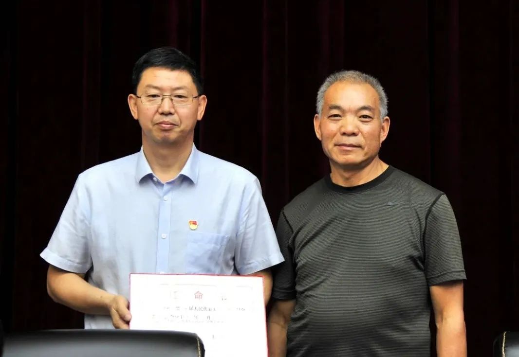 通过区人大常委会对武海印同志的任职提请,决定任命武海印同志为老