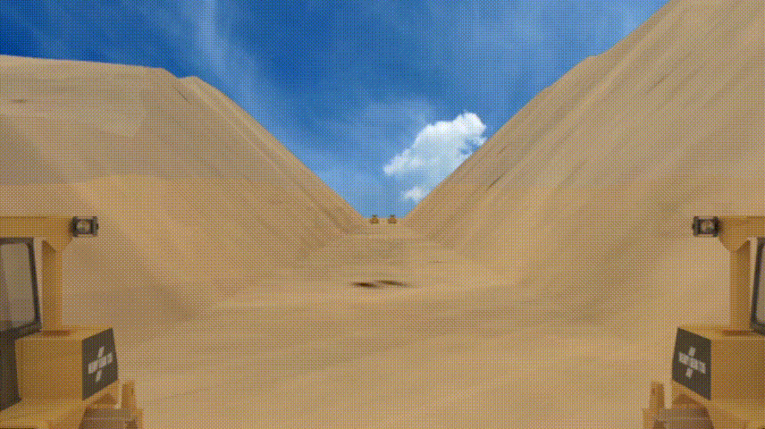 沙丘段形成平整坚实的底基层盆地施工段修筑纵向施工便道和连接取土场