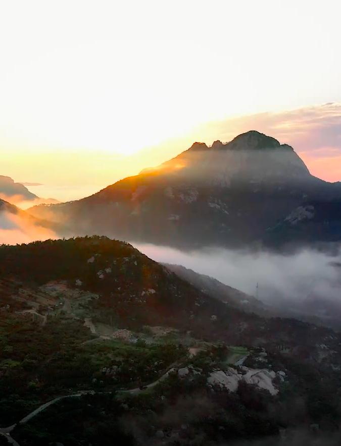 在镜头里还有很多种而昆嵛山的日出之美让人叹为观止红日初升的景象