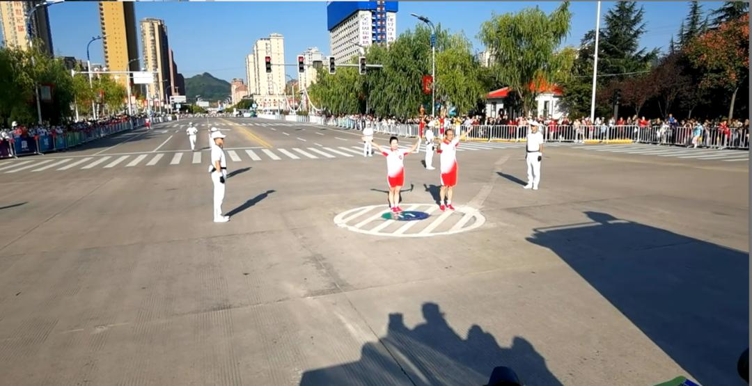 今天,十四运会和残特奥会火炬在商洛传递!