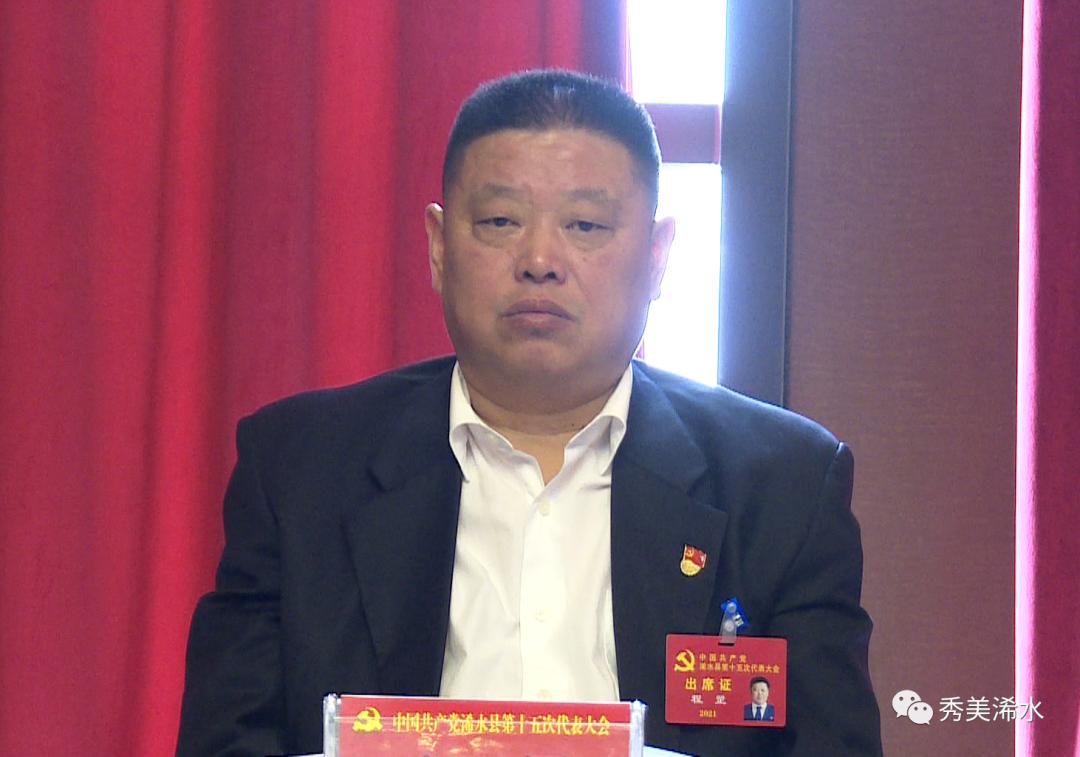 程罡 ,张明波参加洗马镇代表组审议代表们就落实好报告精神踊跃发言.