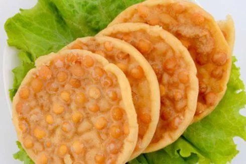 豆角酥这种三角形油炸小点心又叫瓦布丁,瓦角丁,三角酥……其味道酥脆