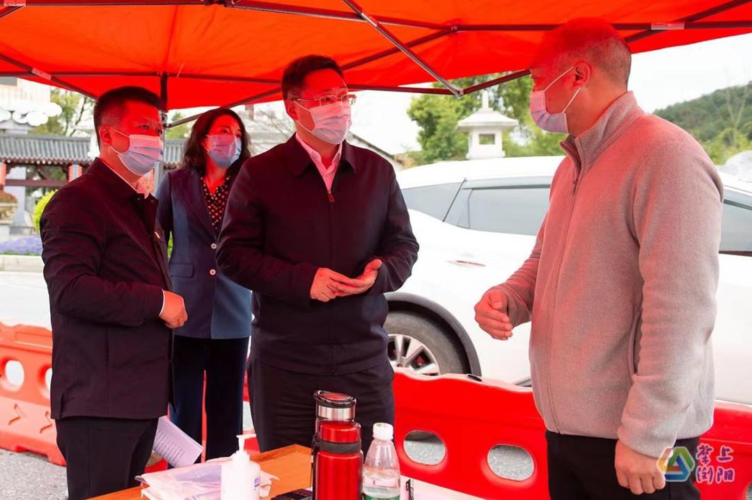 浏阳市领导王坤球,刘来宏参加.