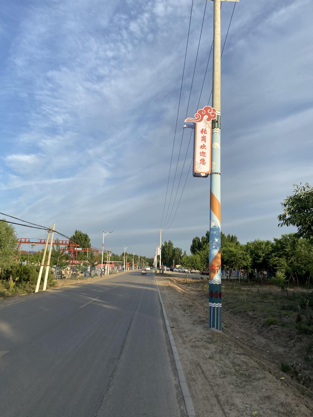 改造后的电线杆改造后的张开路效果图改造前张开路入口处改造后的张开