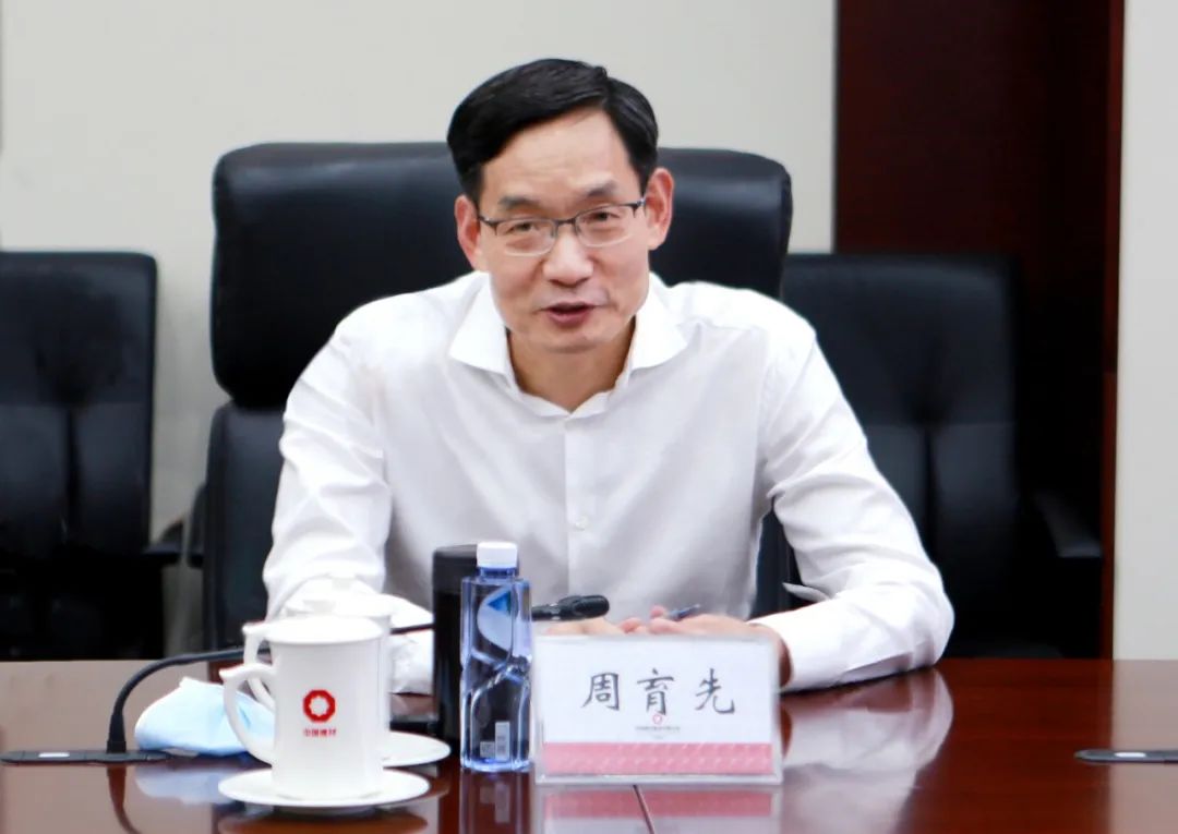 周育先会见中国信达党委书记总裁张卫东一行