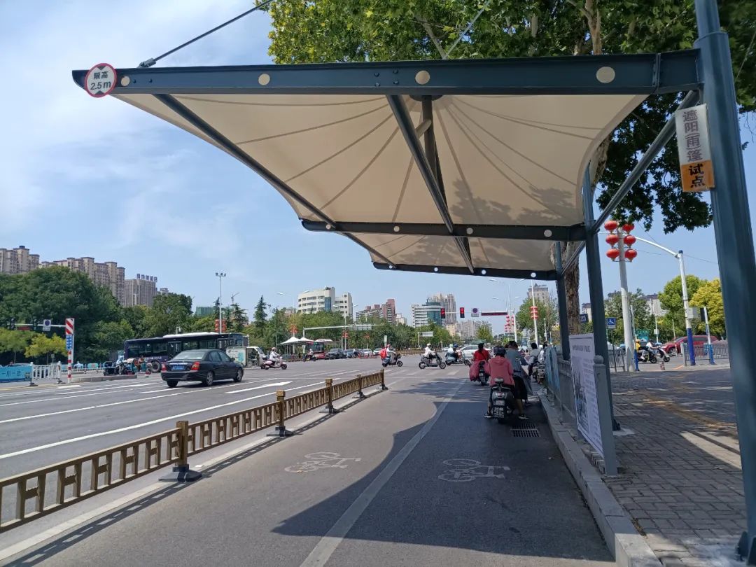 根据方案,除去已经试点建成的2座遮阳棚外,首批规划的其余12座景观式