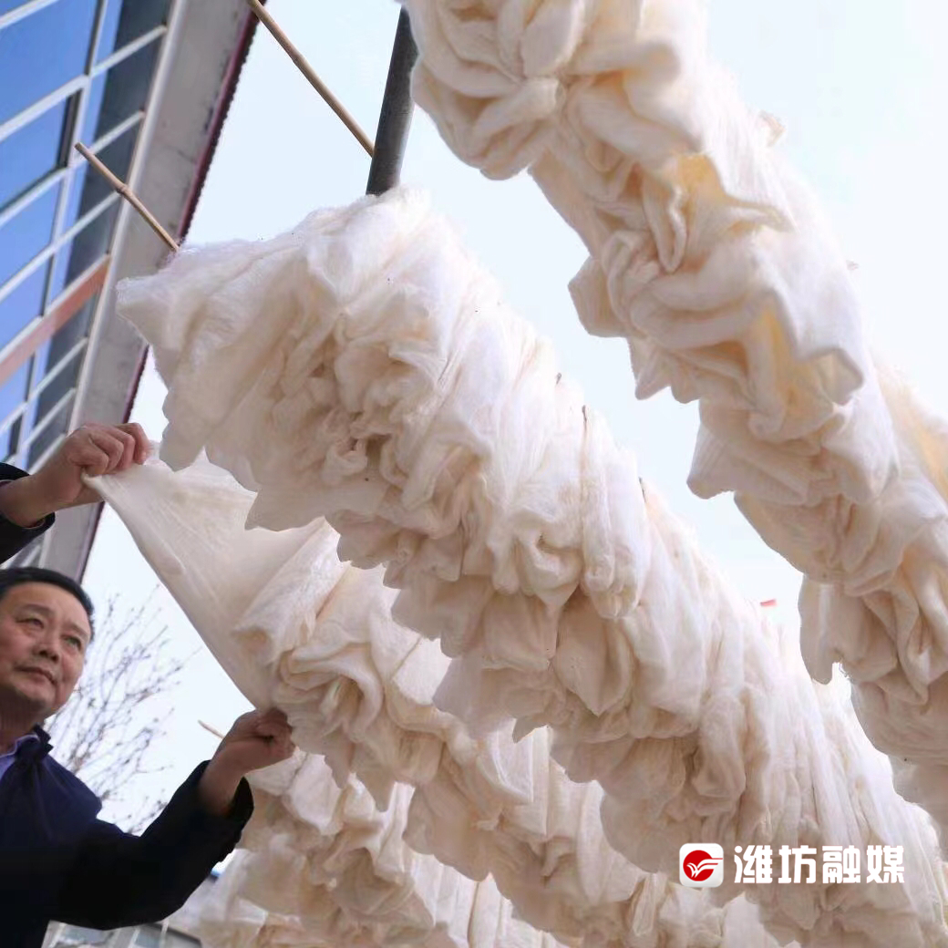 手提蚕丝“巧做被” 非遗化物“入心暖”