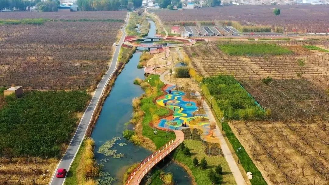 《人民日报》报道雄安新区雄县马蹄湾村:"梨"花香里说丰年_澎湃号