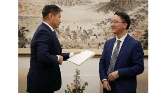 外交部亚洲司司长刘劲松会见蒙古驻华大使巴德尔勒