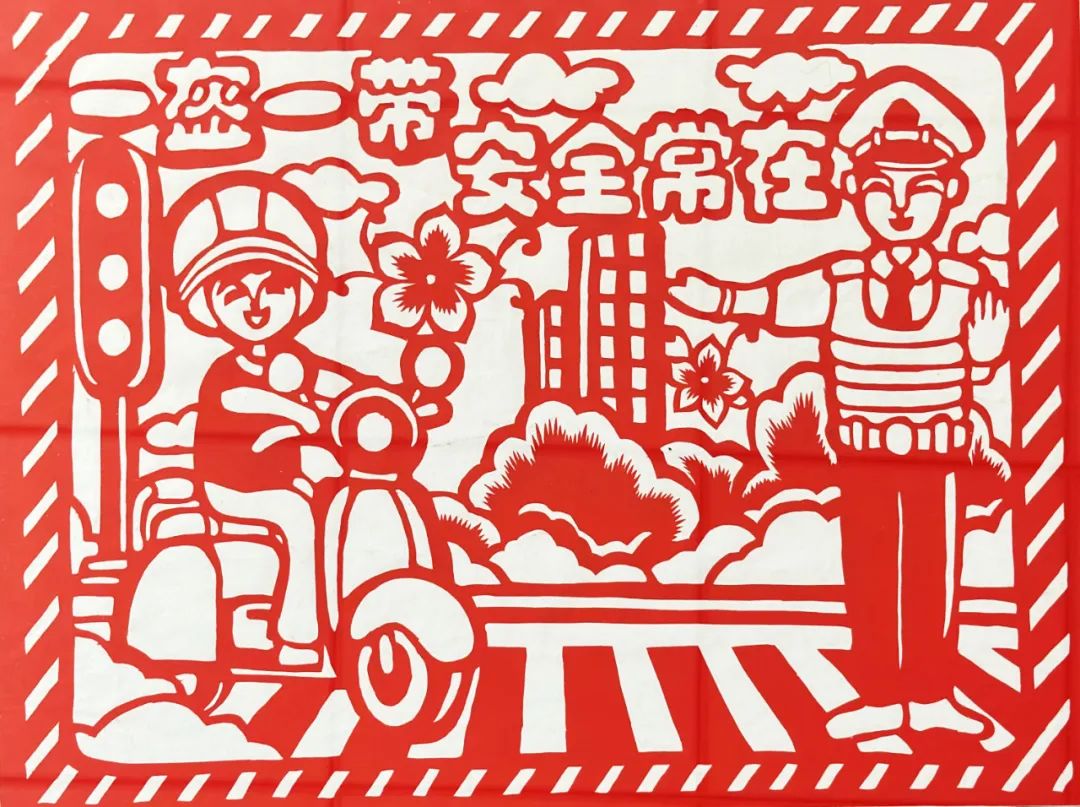 非遗"剪纸邂逅交通安全 吕梁汾阳交警剪出"警"彩
