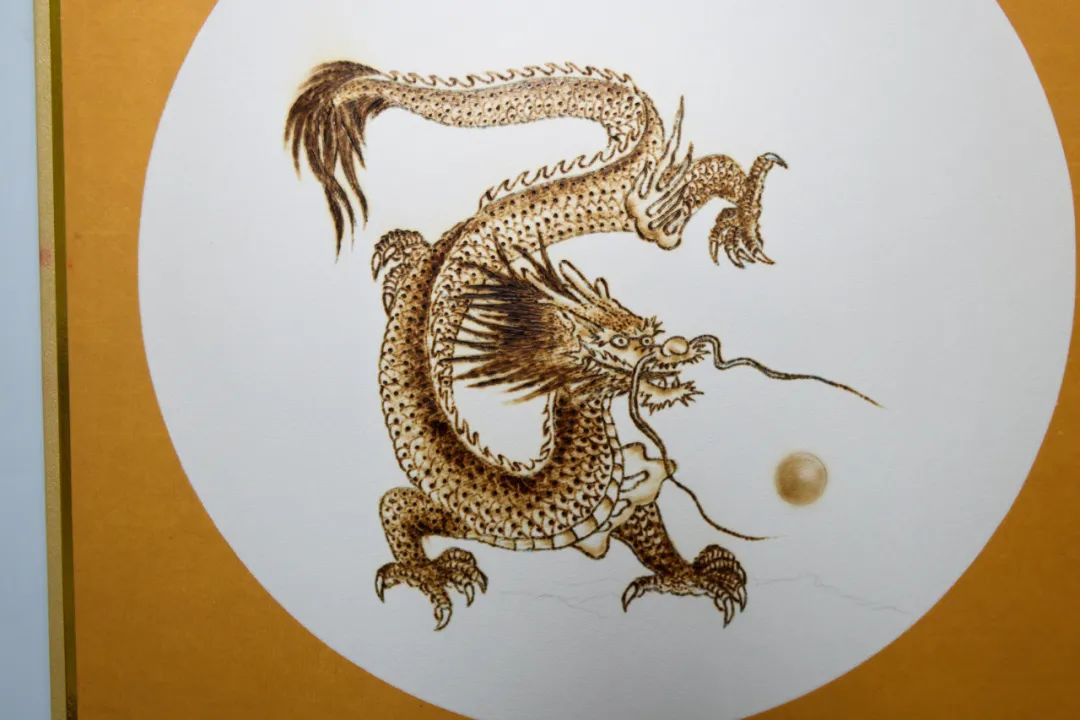 烙铁画"百龙图",你见过吗?