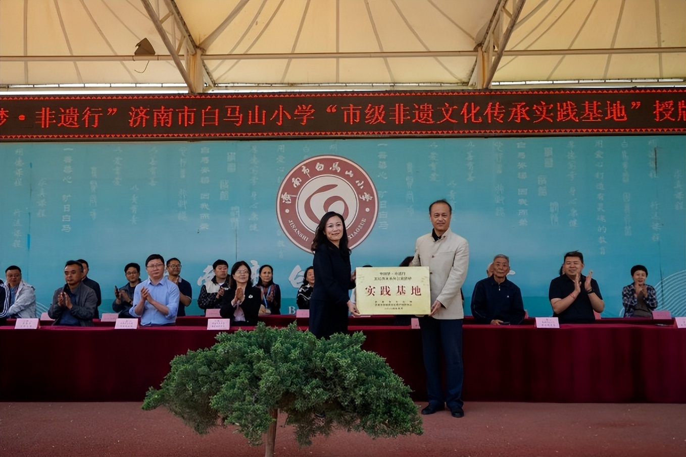 局承办的"中国梦·非遗行"文化传承系列公益活动走进济南市白马山小学