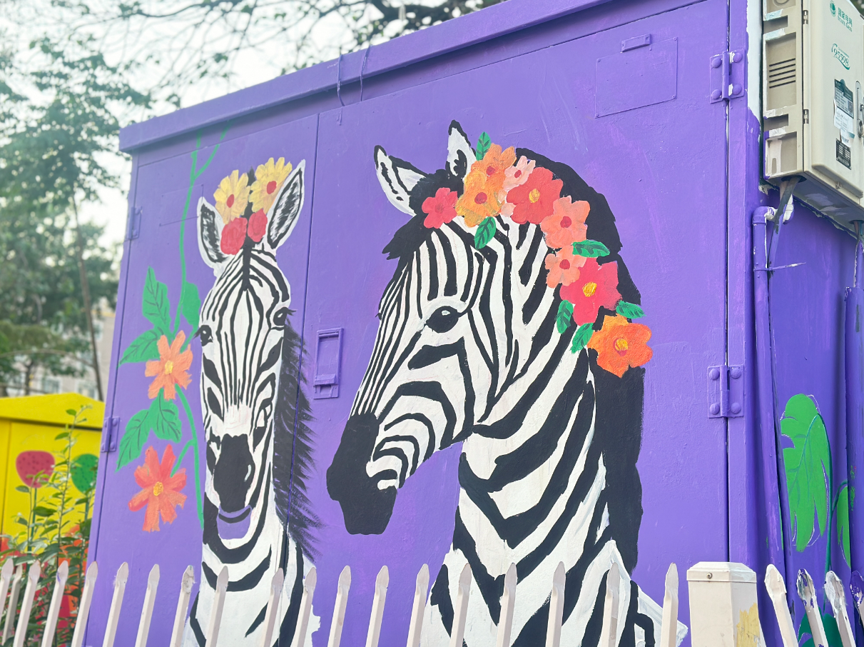 彩绘箱体让菏泽城市街景充满"文艺范"