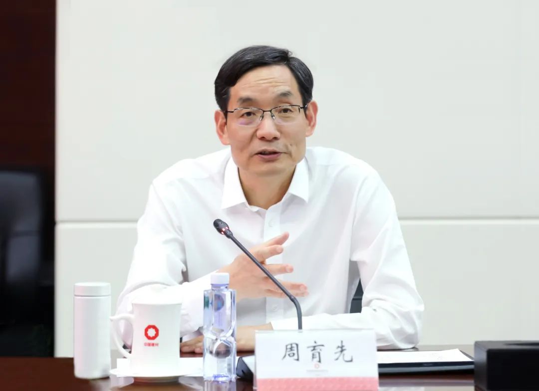 周育先会见中国石化总经理赵东一行