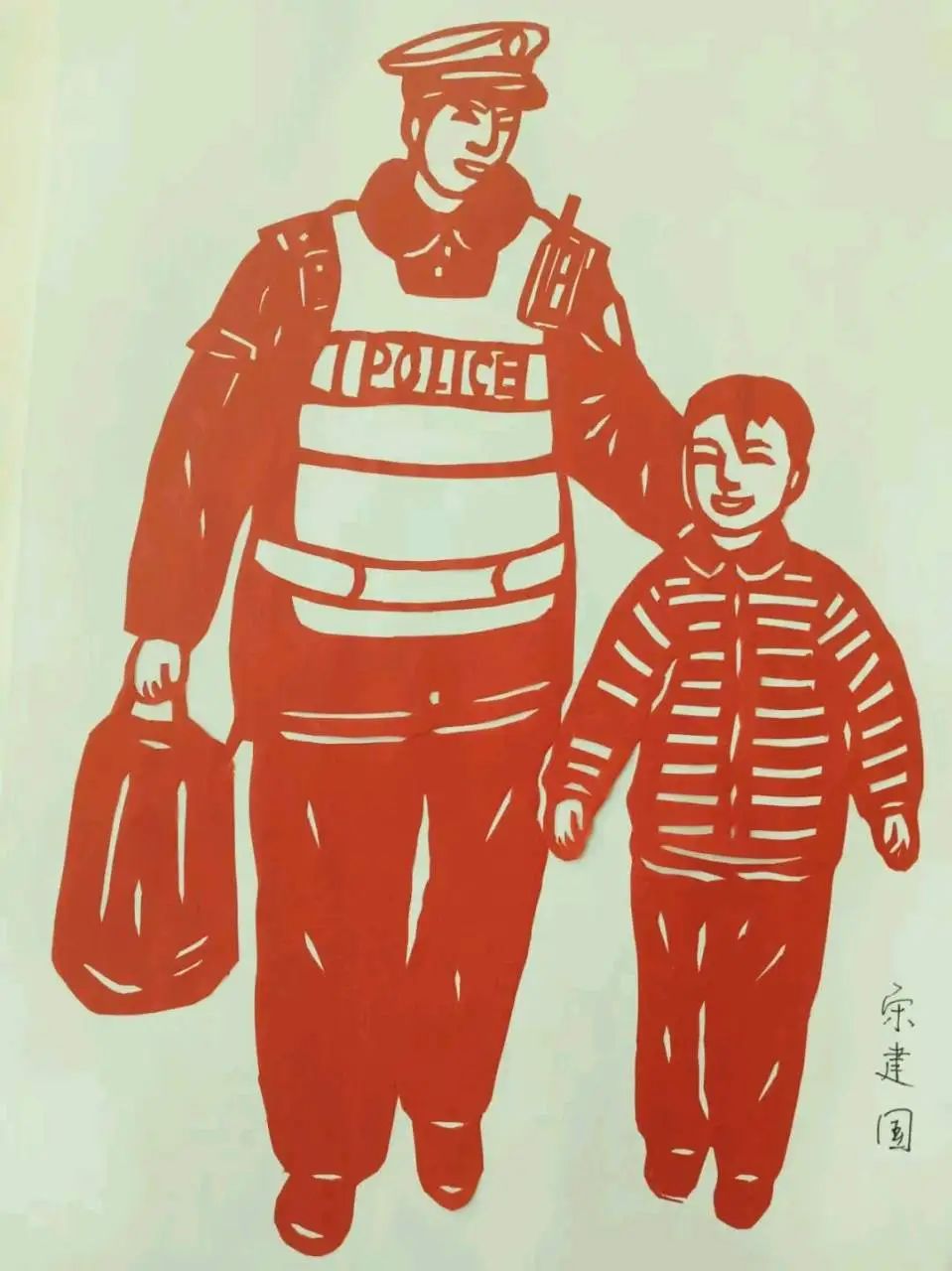 非遗剪纸 剪出别样"警"彩