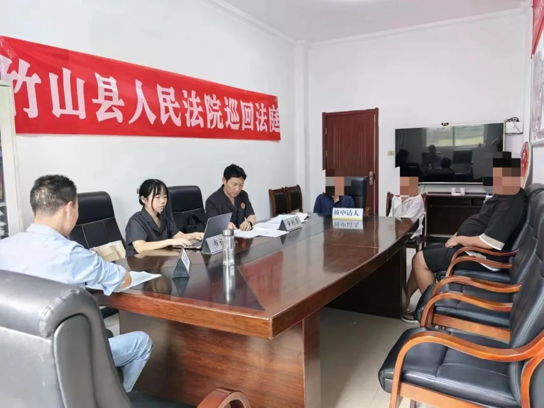 "谢谢竹山法院,谢谢万法官,麻烦你们跑这么远来了解情况",在听到判决