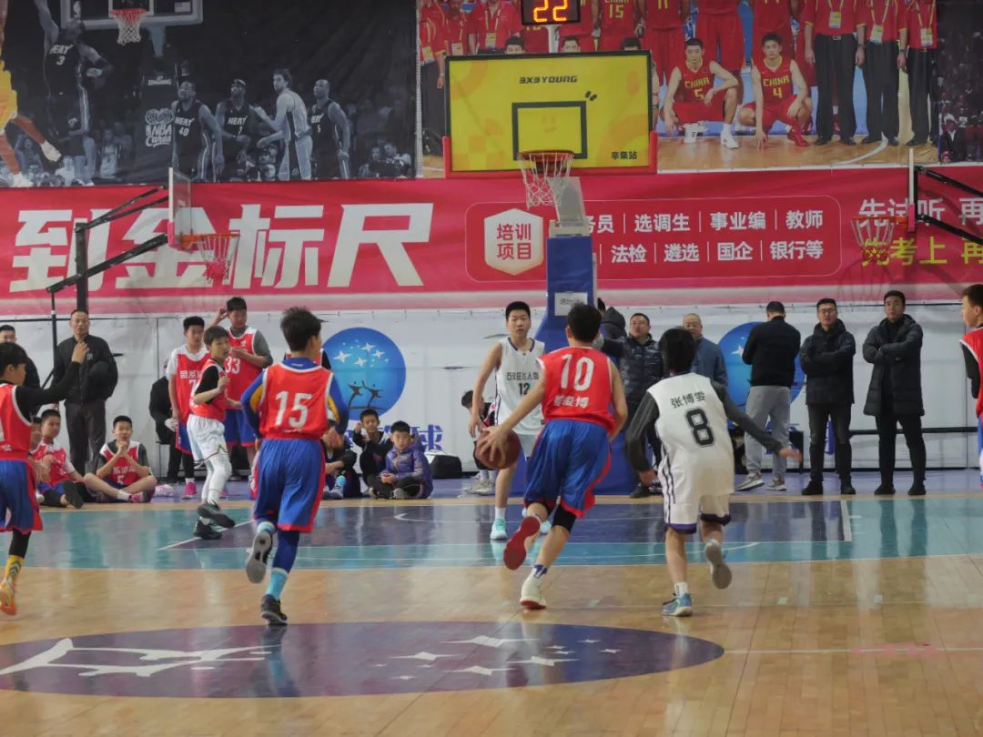 Youth basketball players in action at the Golden Deer Cup