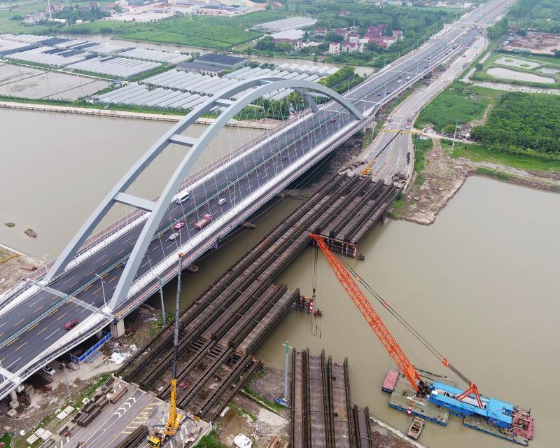 上海最大规模内河枢纽最大跨径的下承式拱桥都与穿越浦东的这条河有关