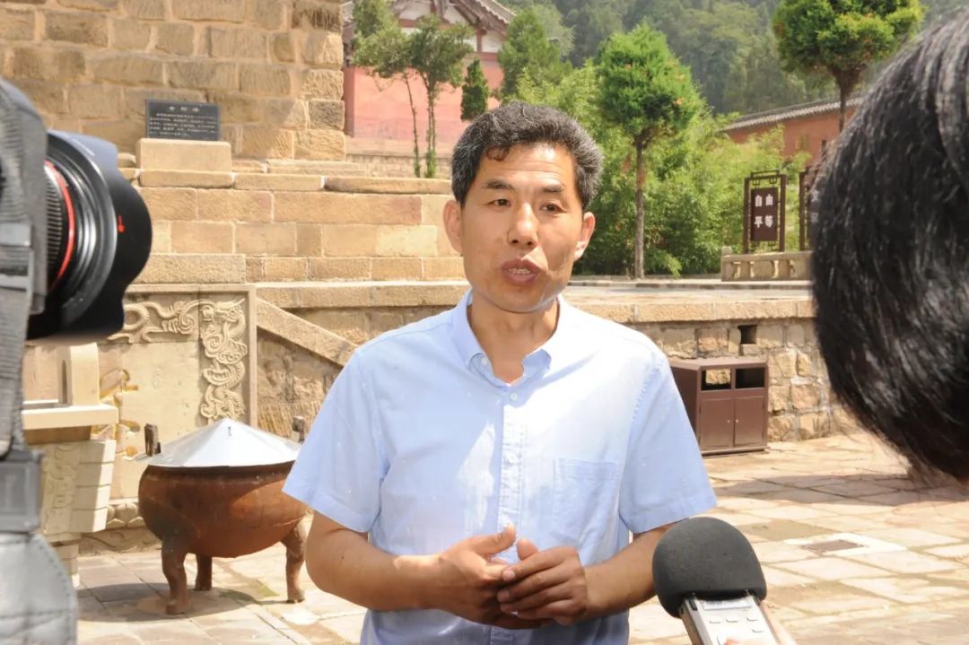 今年48岁的张宇飞曾担任法兴寺,崇庆寺文保员兼讲解员,现任这两所寺院
