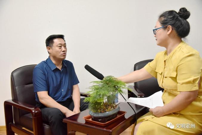 创城一把手访谈录陈朝英提升服务强化监管营造文明有序市场环境