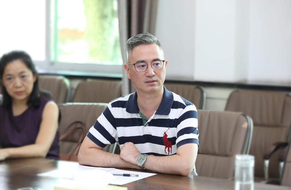 李哲与齐迹科技公司董事长齐爱民座谈