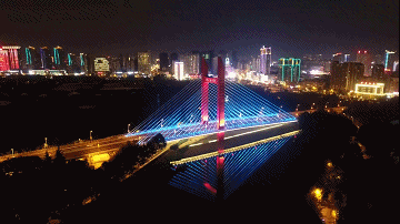celebration则是一座跨越长河的星门流光溢彩的淠史杭大桥celebration