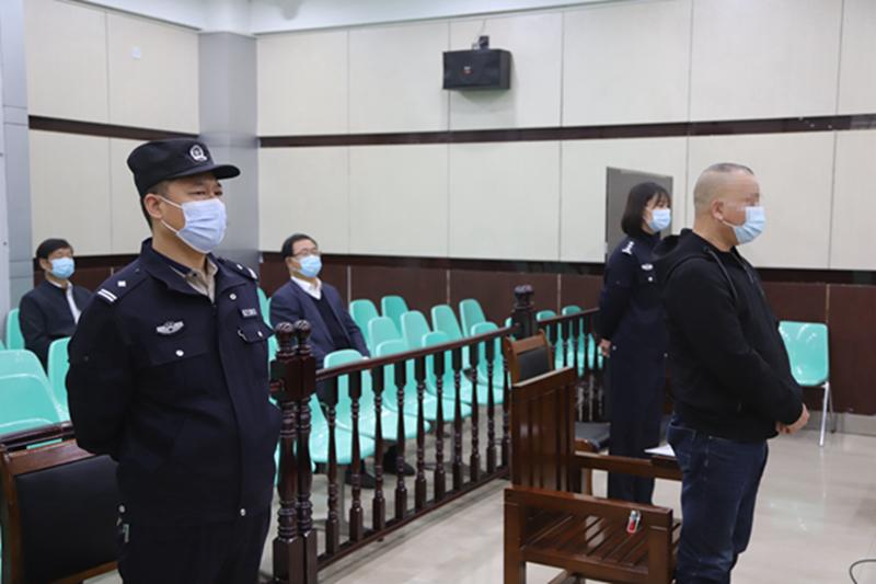 平川区人民法院公开开庭审理一起涉嫌洗钱罪案件