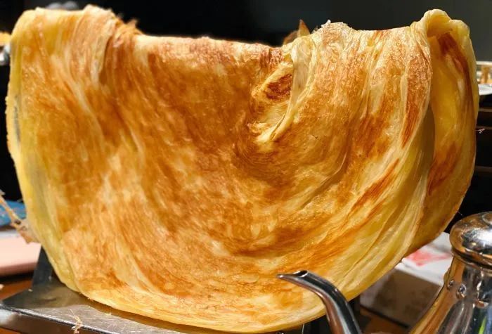 手撕着吃起来根本停不下来油,香,奶,酥一样不差晾衣大饼,它的层次感和