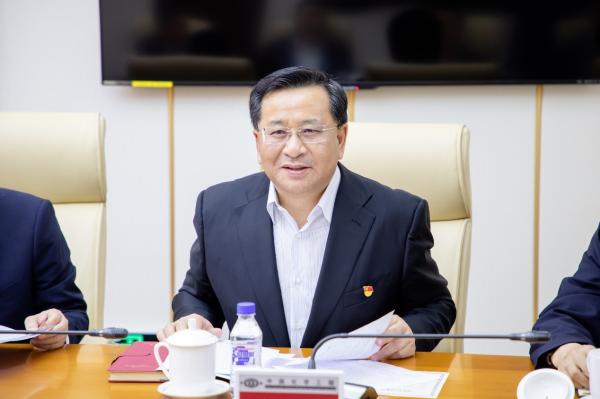 戴和根会见上海市委常委副市长吴清